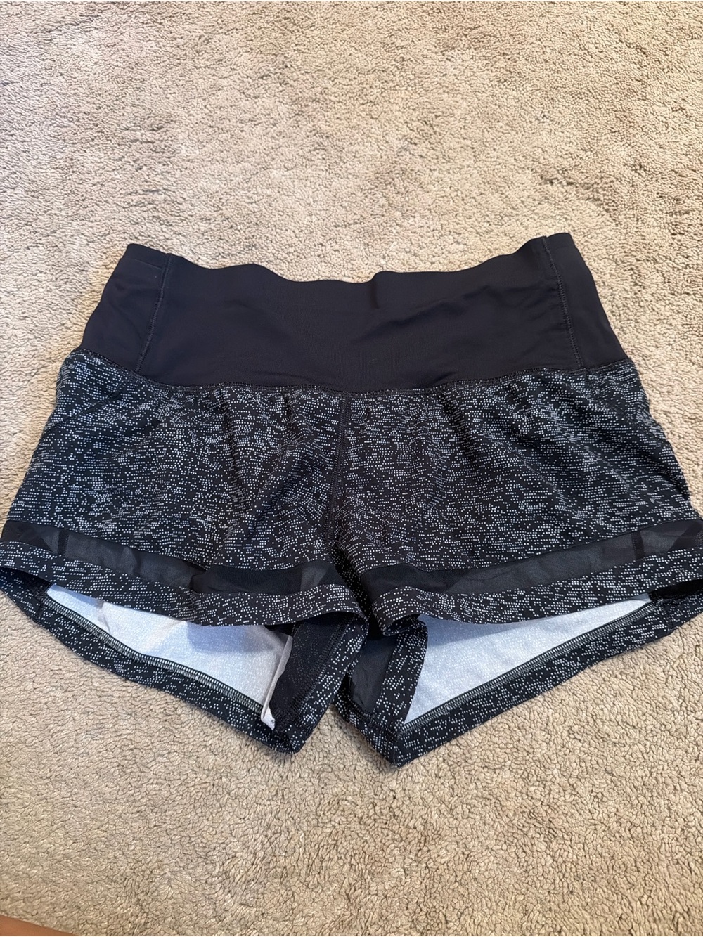 Lululemon black and gray speckled shorts with back zipper pocket size Small